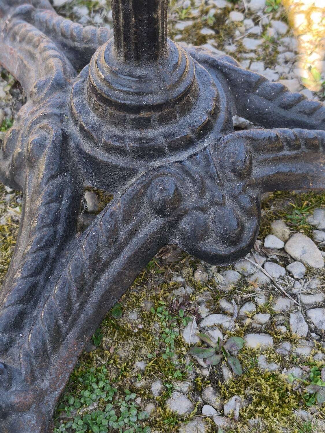 Marble bistro table with cast iron legs in Parisian café style