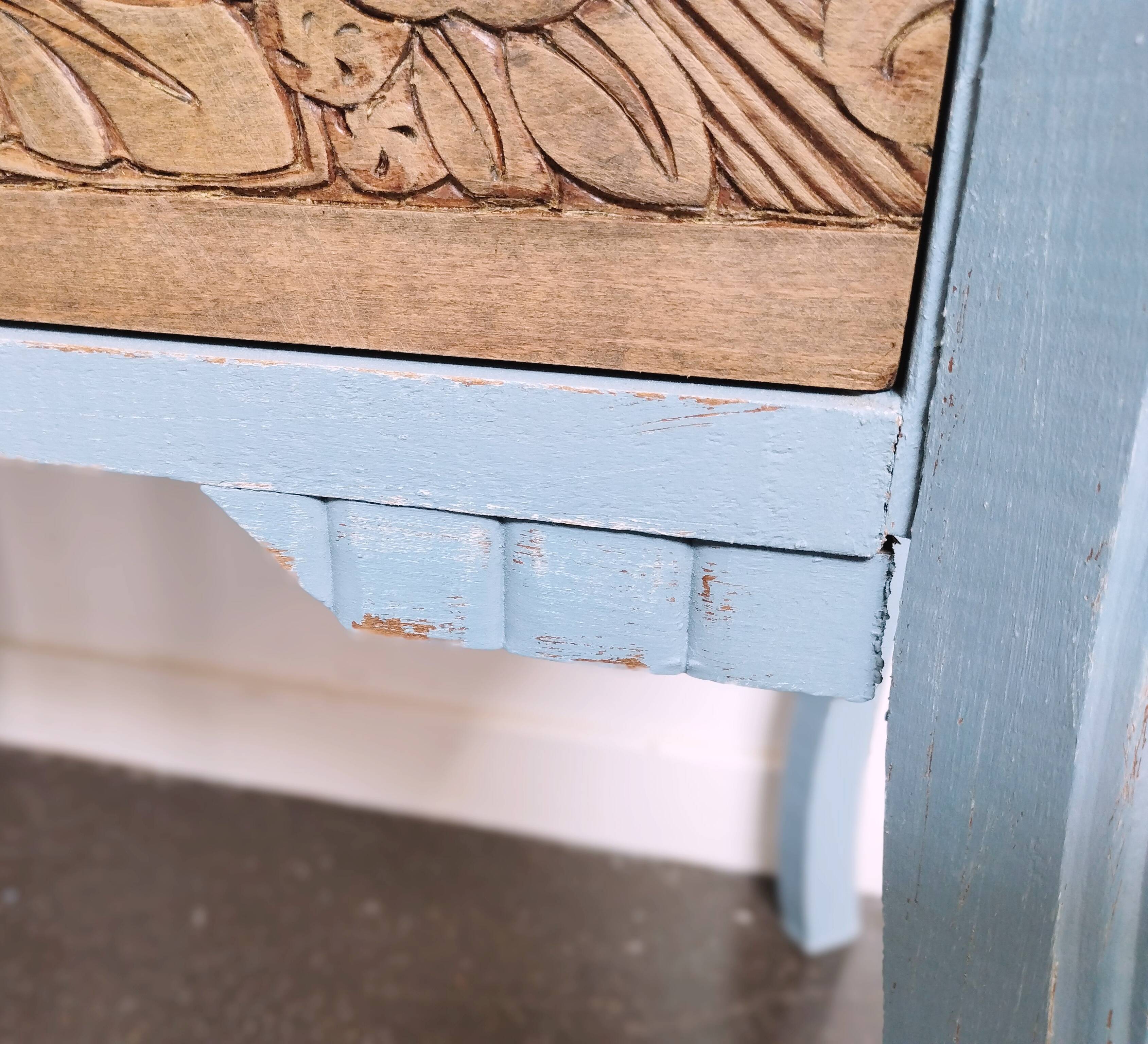 Small carved wood chest of drawers