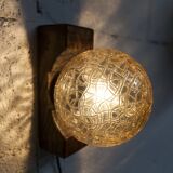 1960s ball wall light in dark wood and amber glass