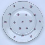 Porcelain serving dishes with small flowers and silver edging and