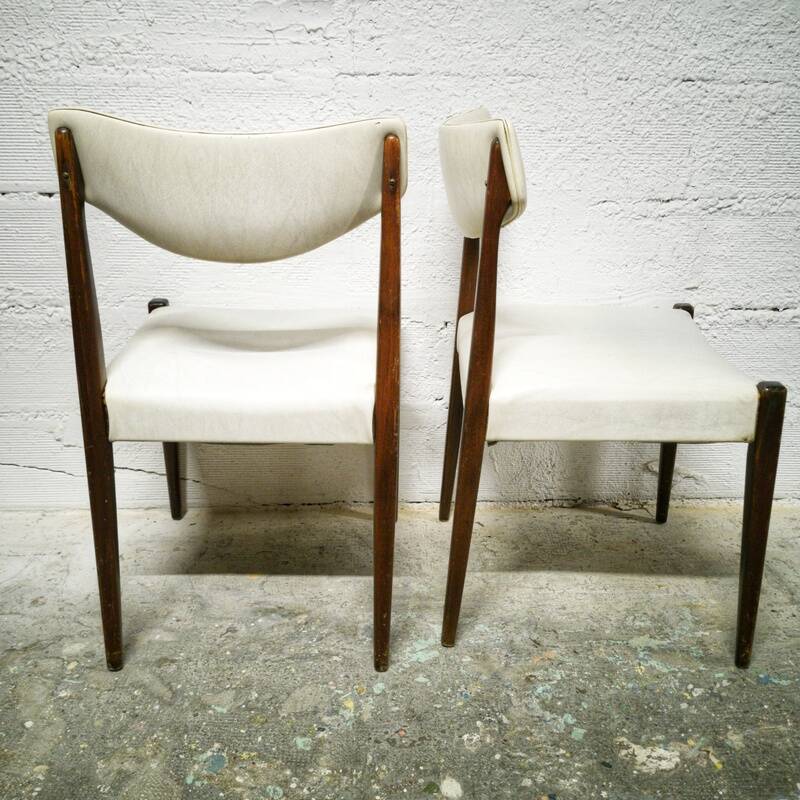 Pair of vintage teak and skai chairs