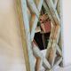 Old mirror claustras in Burmese teak