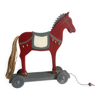 Antique toy, small horse on wheels