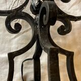 Pair of 3-light wrought iron candlesticks on vintage legs