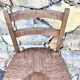 Chaise haute paillée de bar