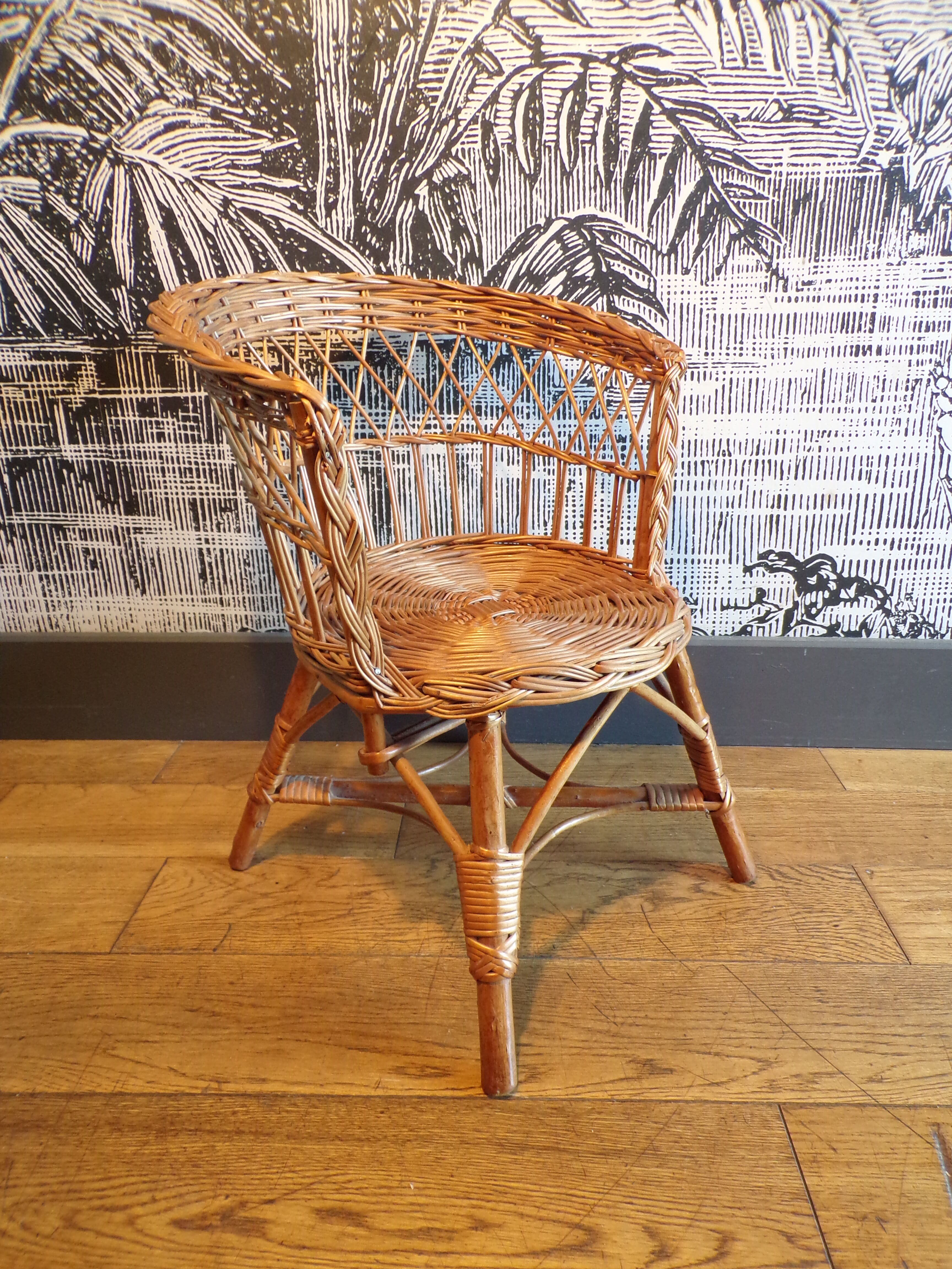 Vintage children's armchair in wicker