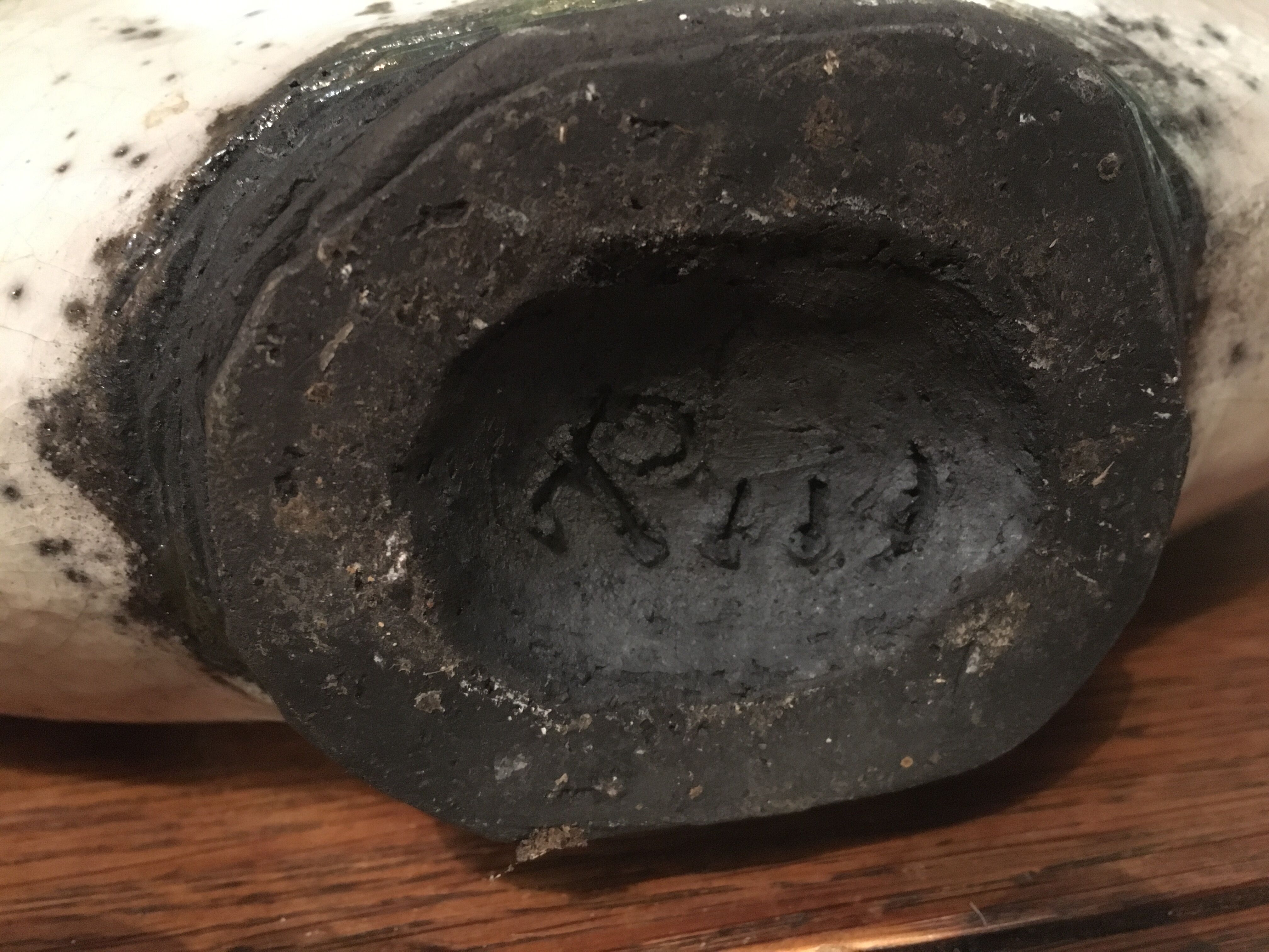 Enamelled ceramic bottle signed