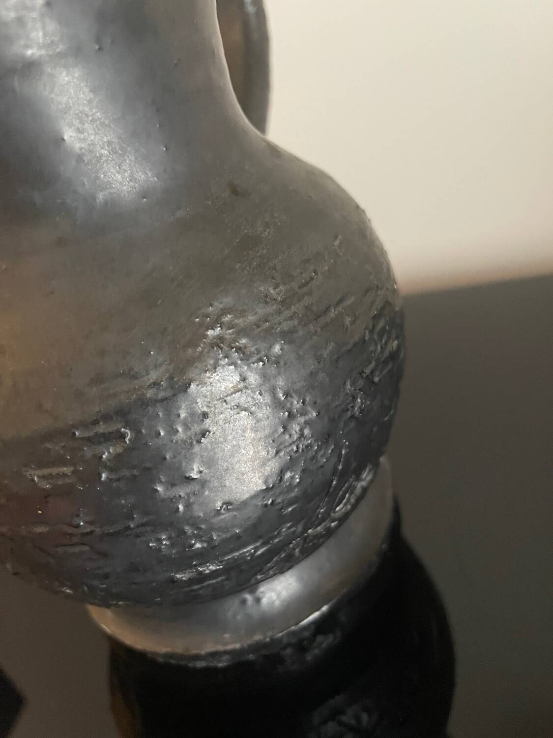 Black ceramic pitcher by Jean Marais