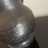 Black ceramic pitcher by Jean Marais