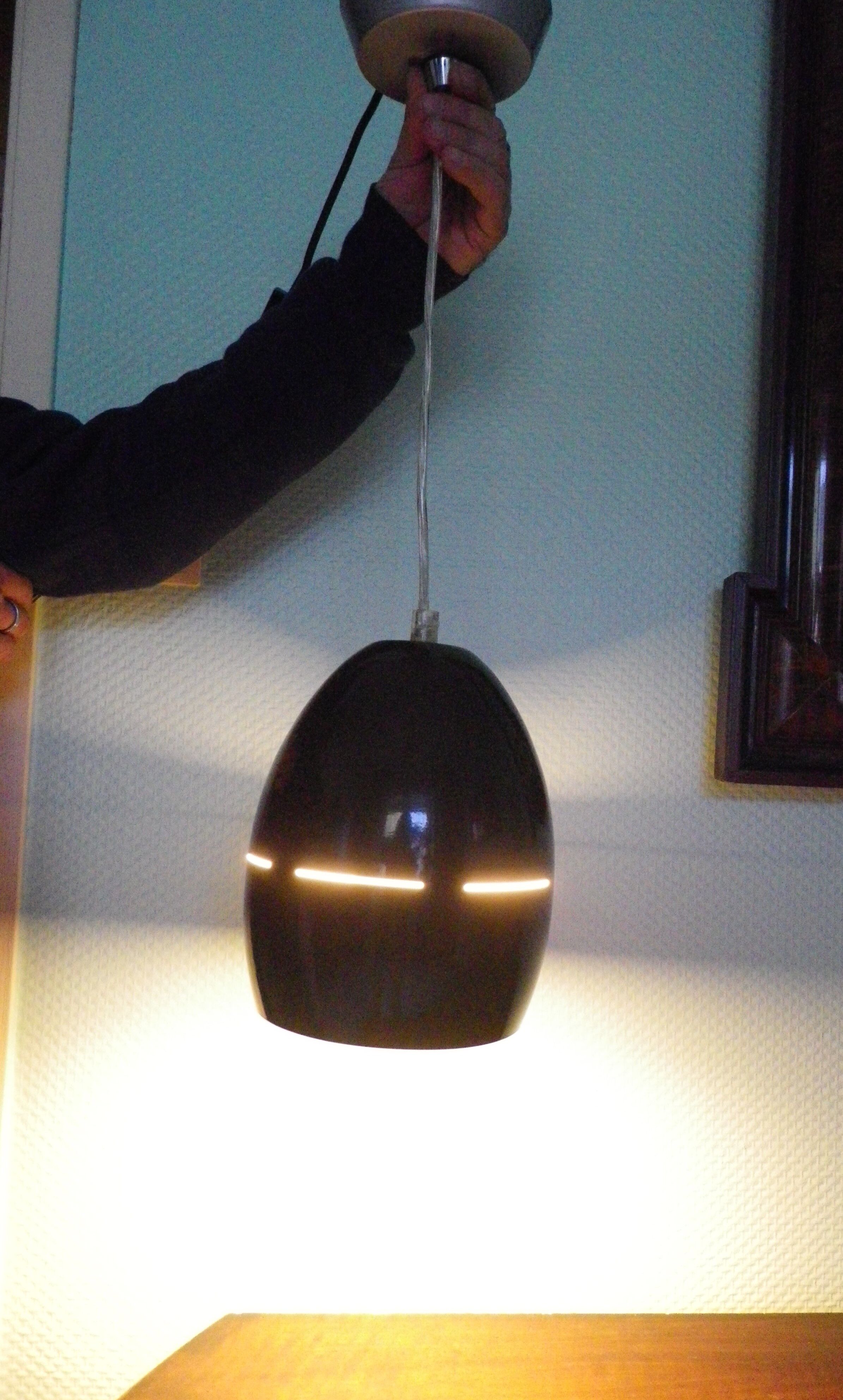Space age style pendant lamp in openwork black metal