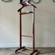 Reguitti valet on casters in dark wood