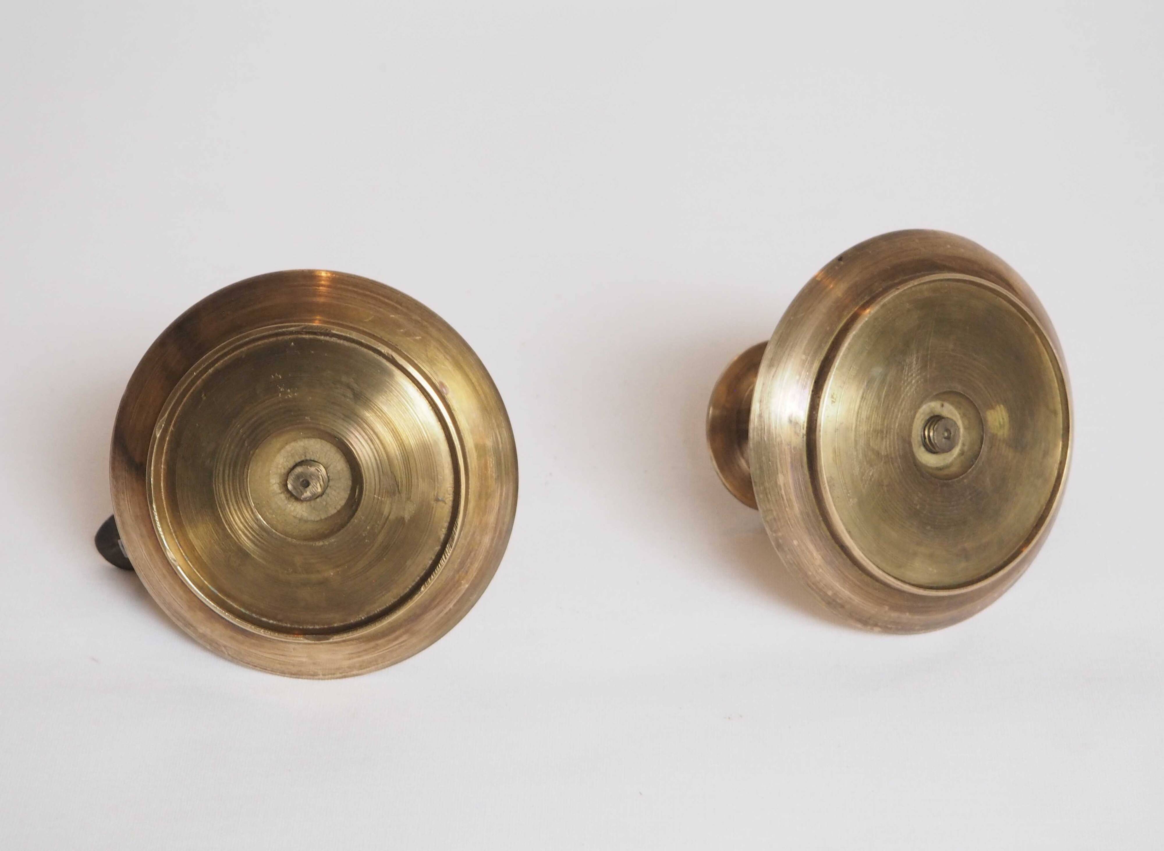 Brass candle holder with cup and handle