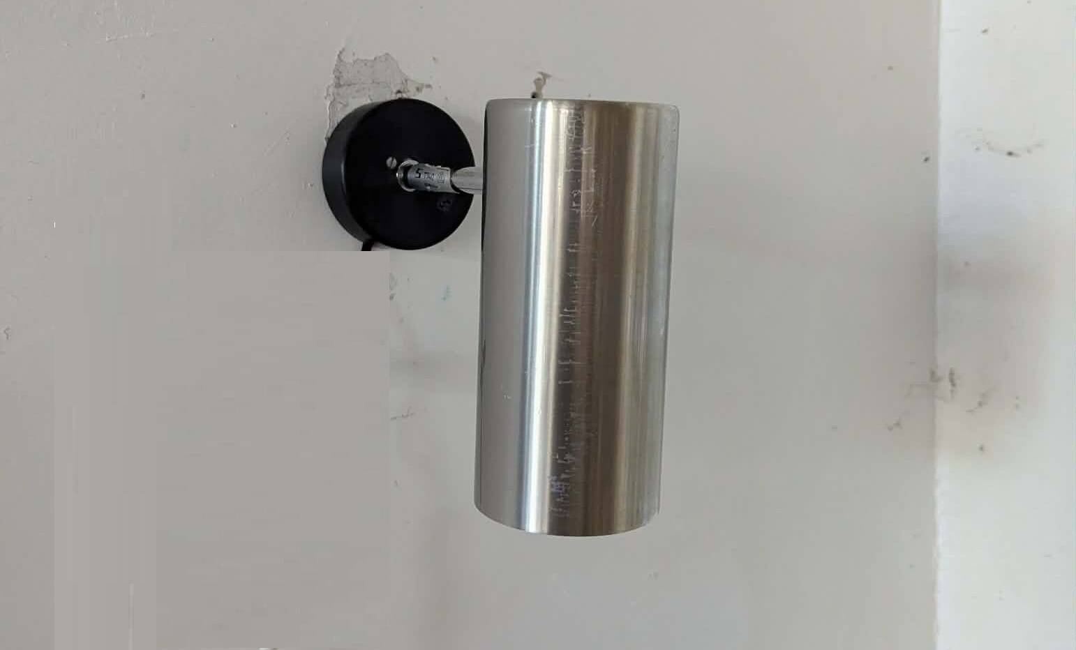 Pair of brushed aluminium tube wall lights from the 70s.