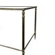 Side table in brass and smoked glass
