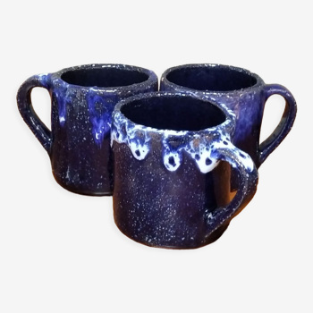 Trois tasses à café