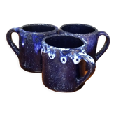 Trois tasses à café