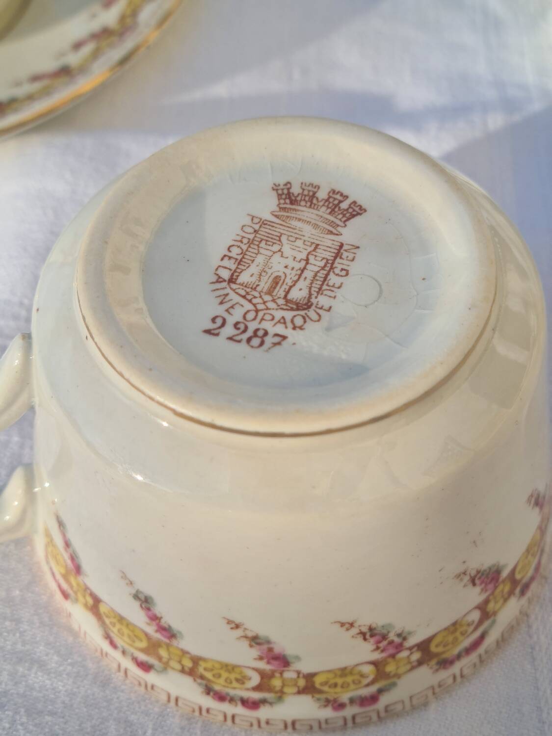 Gien opaque porcelain cups from the early 20th century