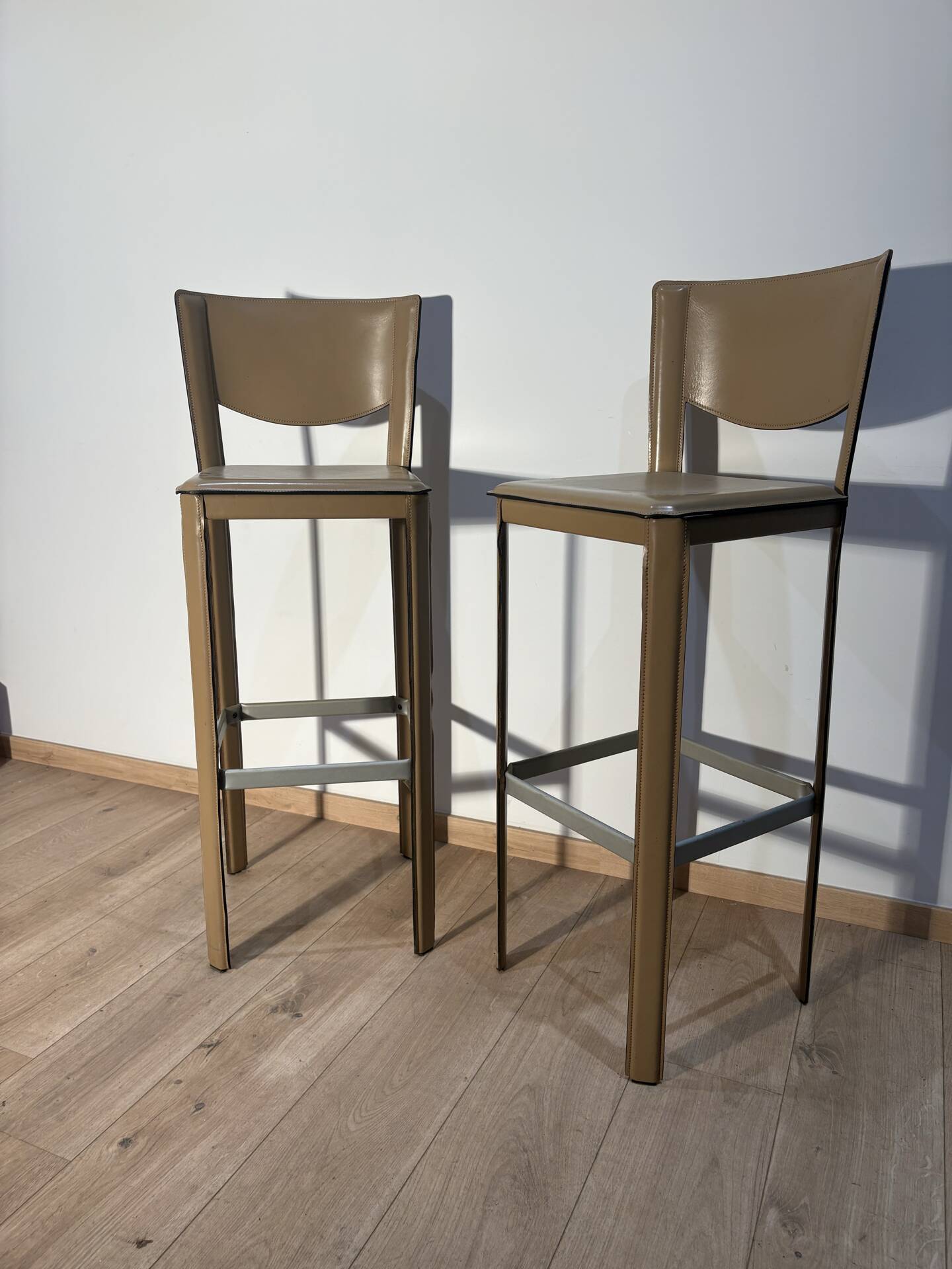 Pair of leather stools Enrico Pellizoni