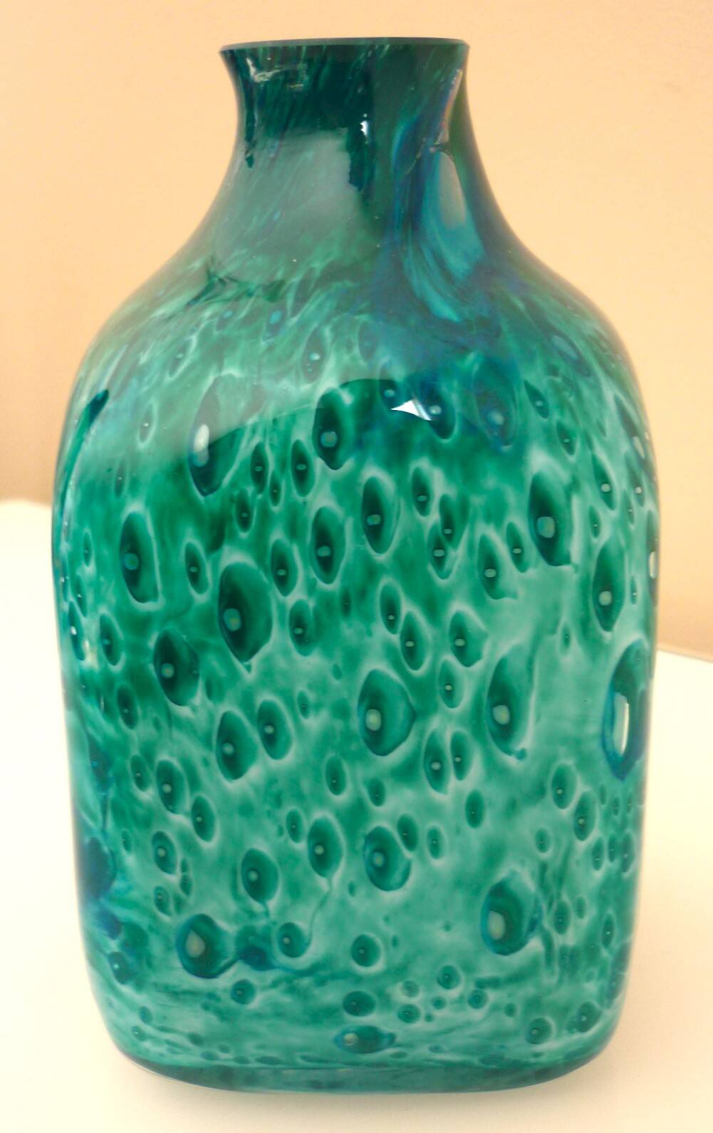White multi-layer blown glass bottle vase with blue and green inclusions