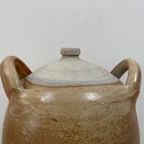 Ancient jar in varnished sandstone