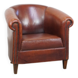 English style sheepskin club chair with a beautiful patina