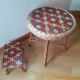 Rattan table and its small bench