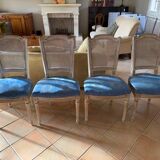 Set of 4 elegant Louis XVI style chairs in cream patinated wood.