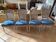 Set of 4 Louis XVI style chairs in cream patinated wood.