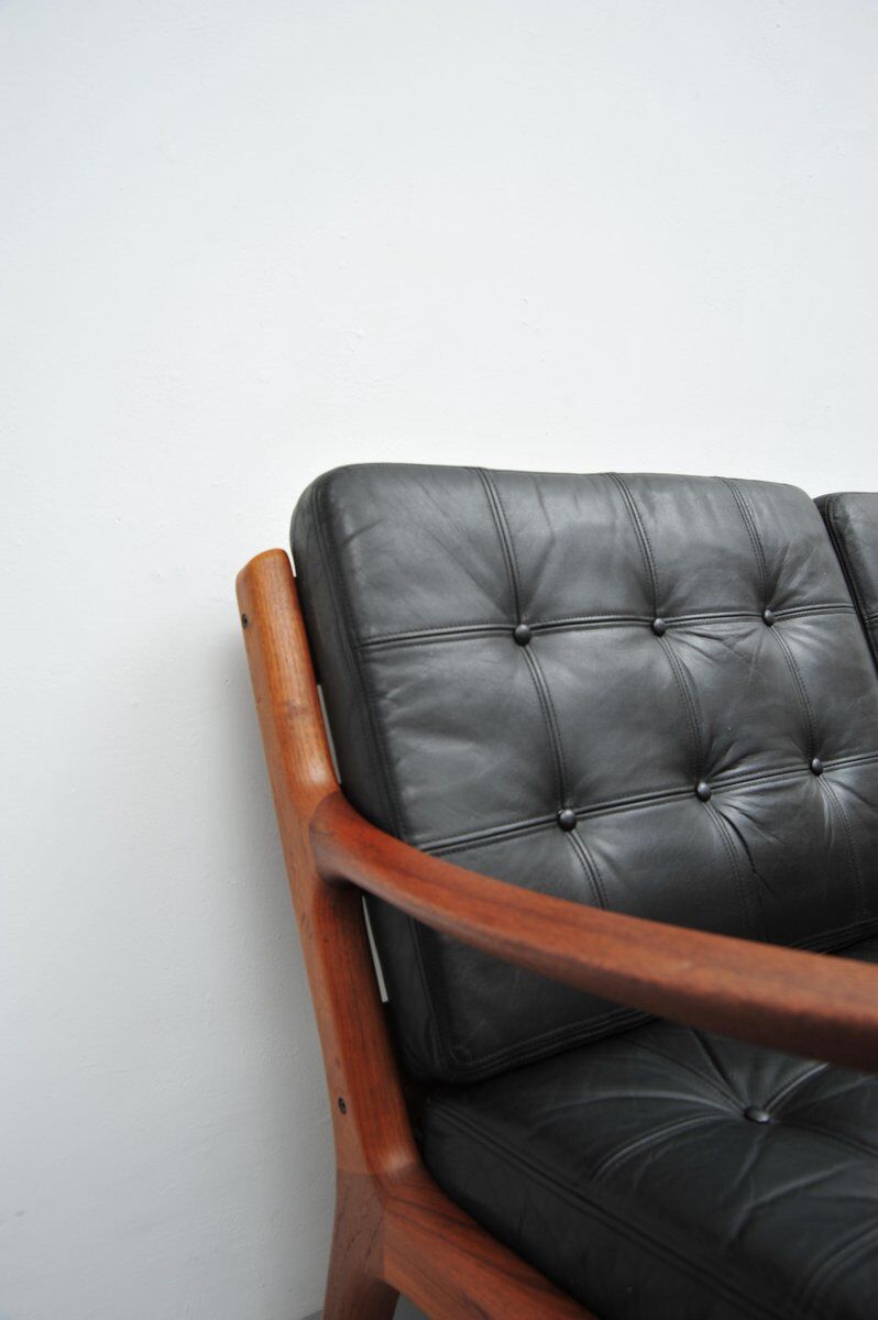 Senator sofa with black leather cushions by Ole Wascher for France and Son