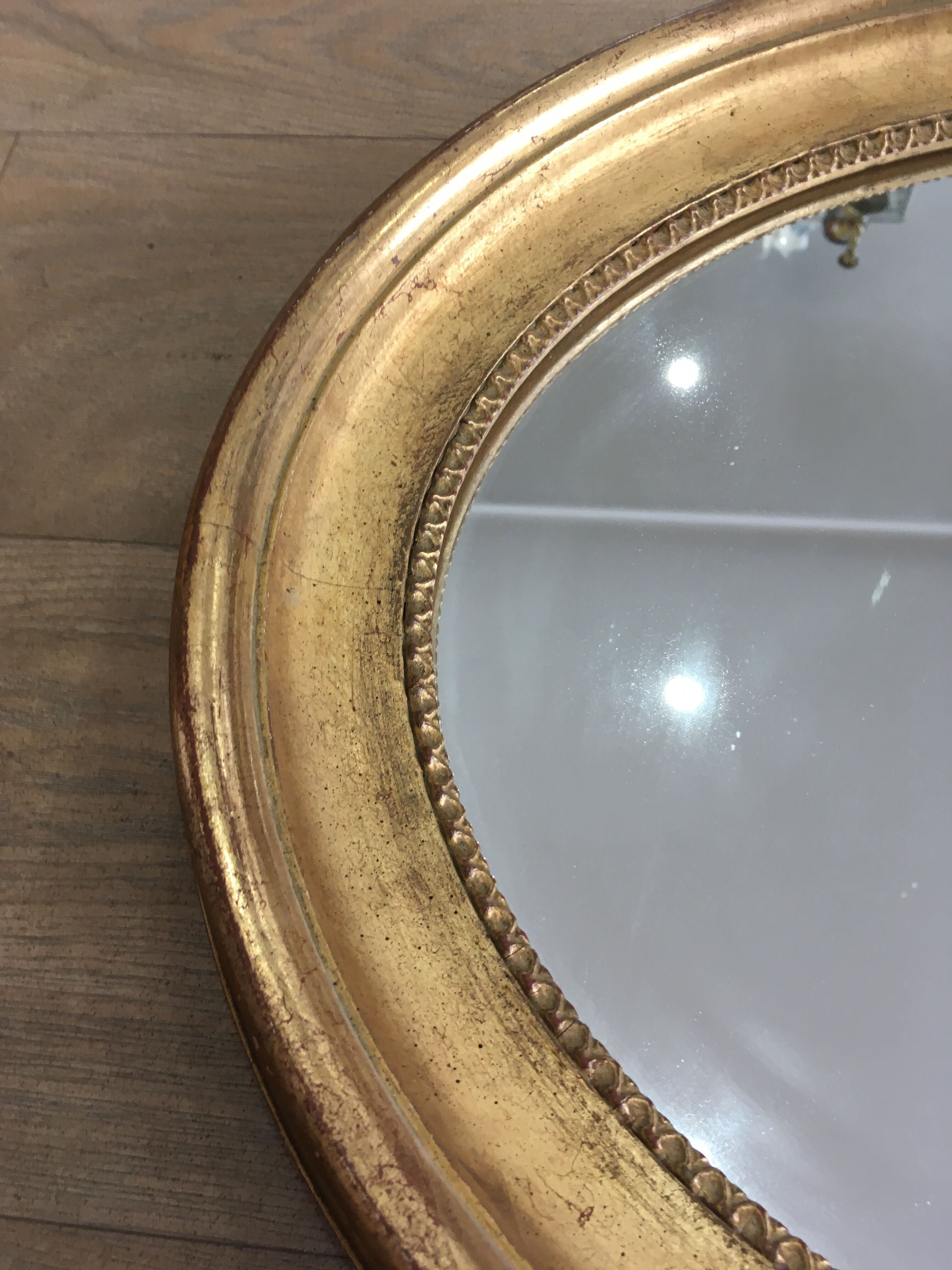 Old mirror gilded wooden frame.