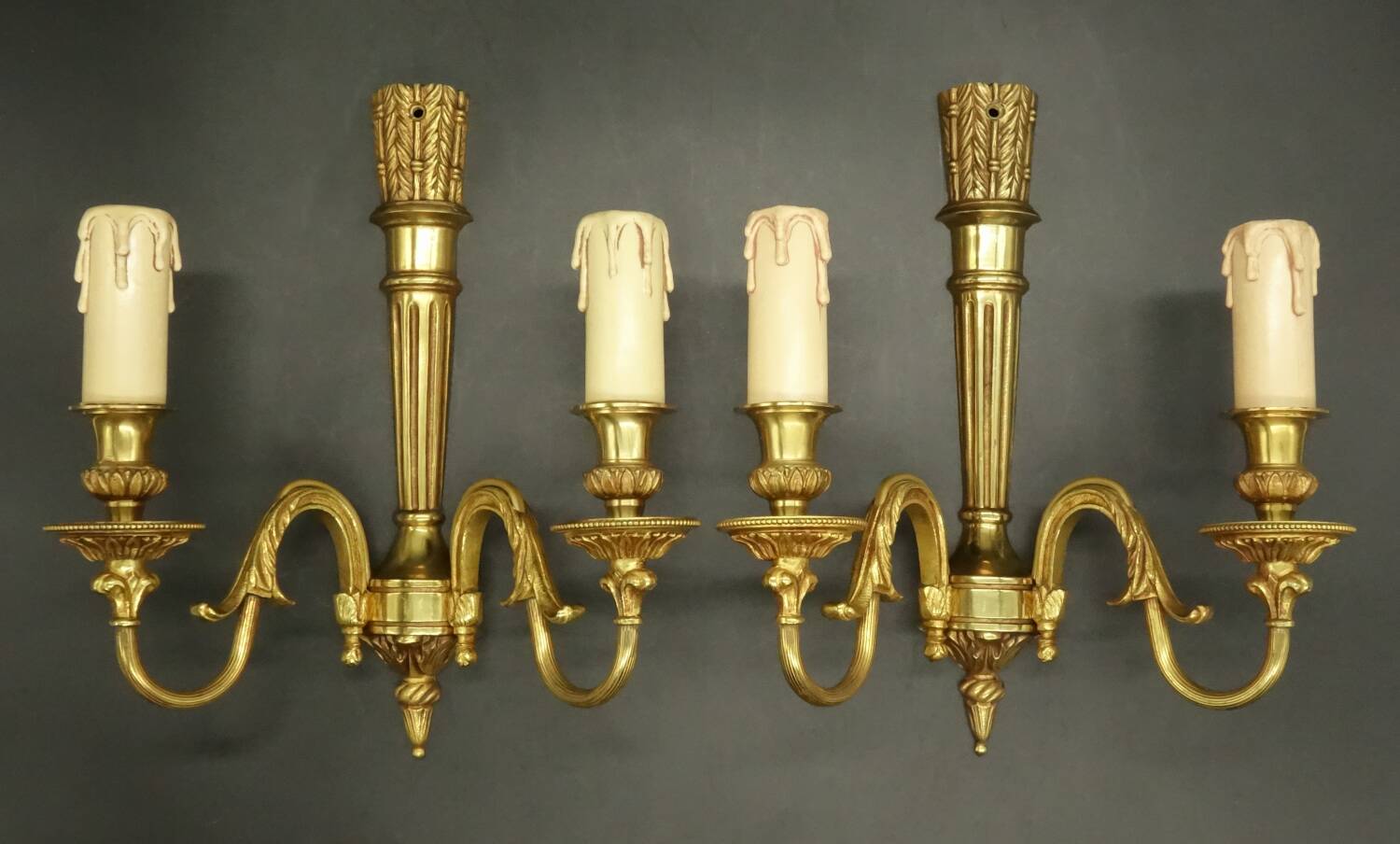 Pair of Louis XVI style quiver sconces in gilded bronze
