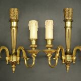 Pair of Louis XVI style quiver sconces in gilded bronze