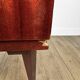 1950s bedside table in varnished wood veneer and brass.