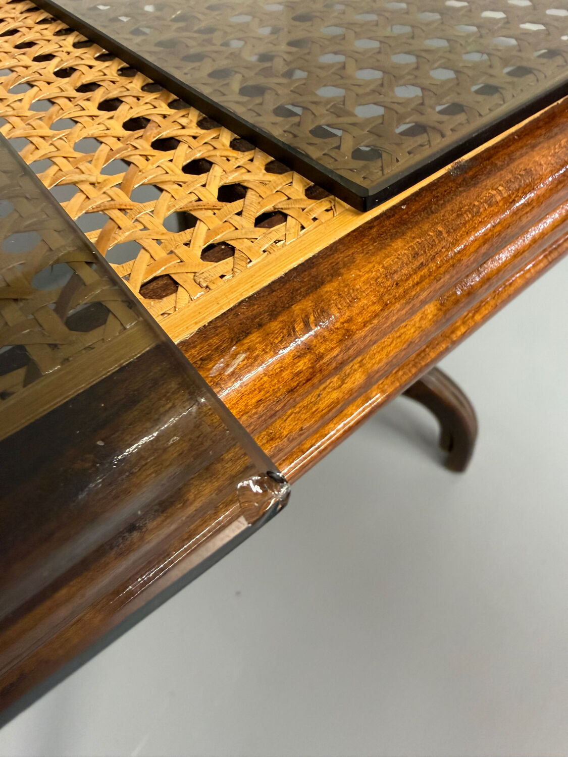 Vintage dining table with a cane top by Mundus from the 1970s.
