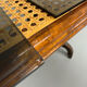 Vintage dining table with a cane top by Mundus from the 1970s.