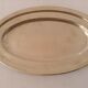 Flat oval silver metal