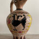 Clay pitcher with a bird head