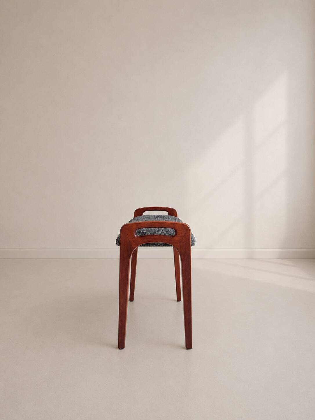 Teak piano bench attributed to Johannes Andersen for Uldum Møbelfabrik.