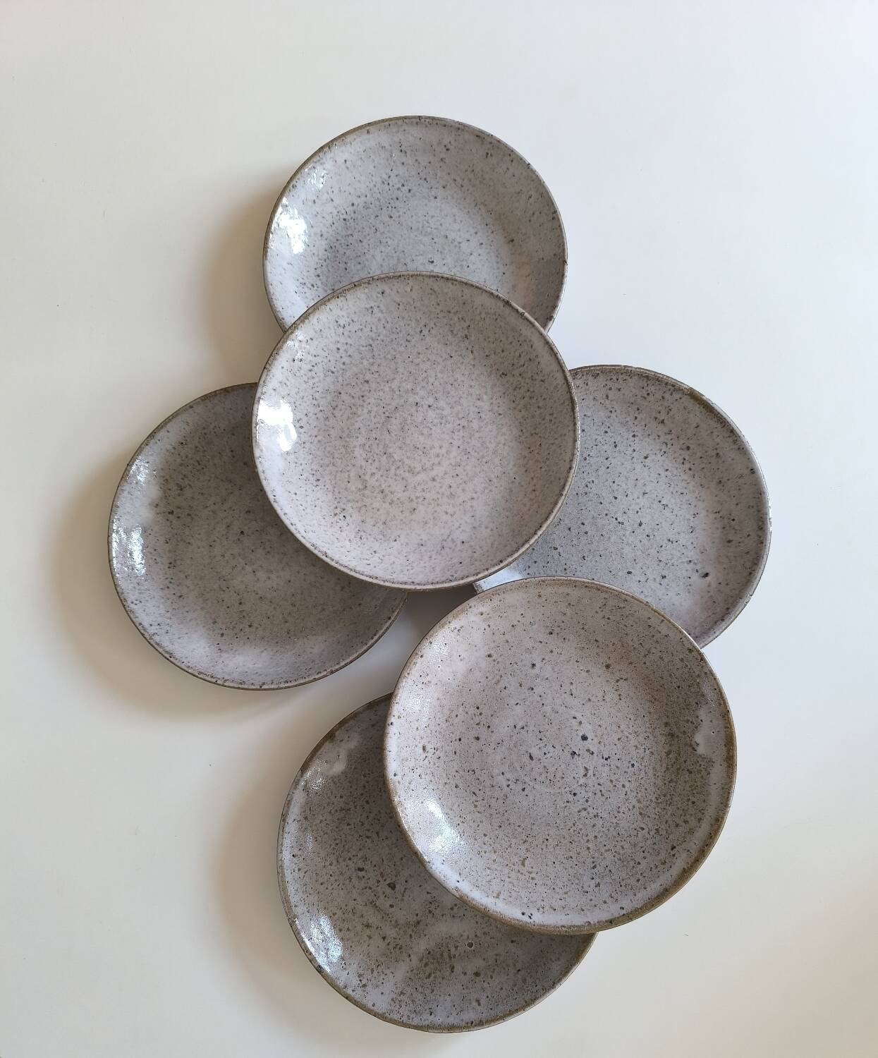 Set of six glazed stoneware plates