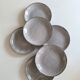 Set of six glazed stoneware plates