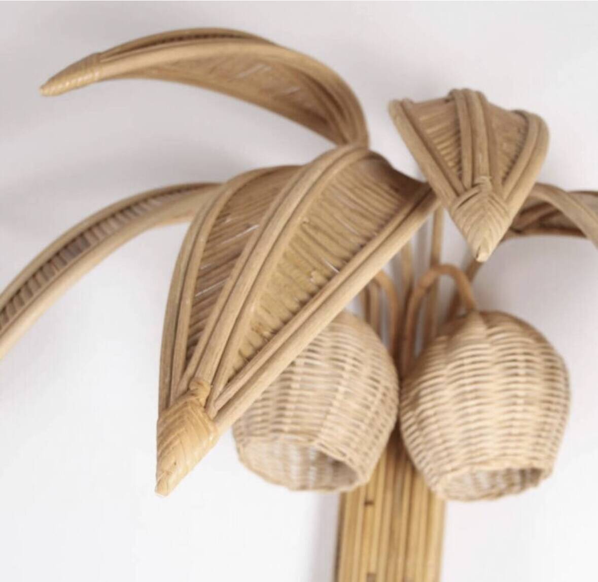 Pair of large "coconut/palm" wall lights in rattan.
