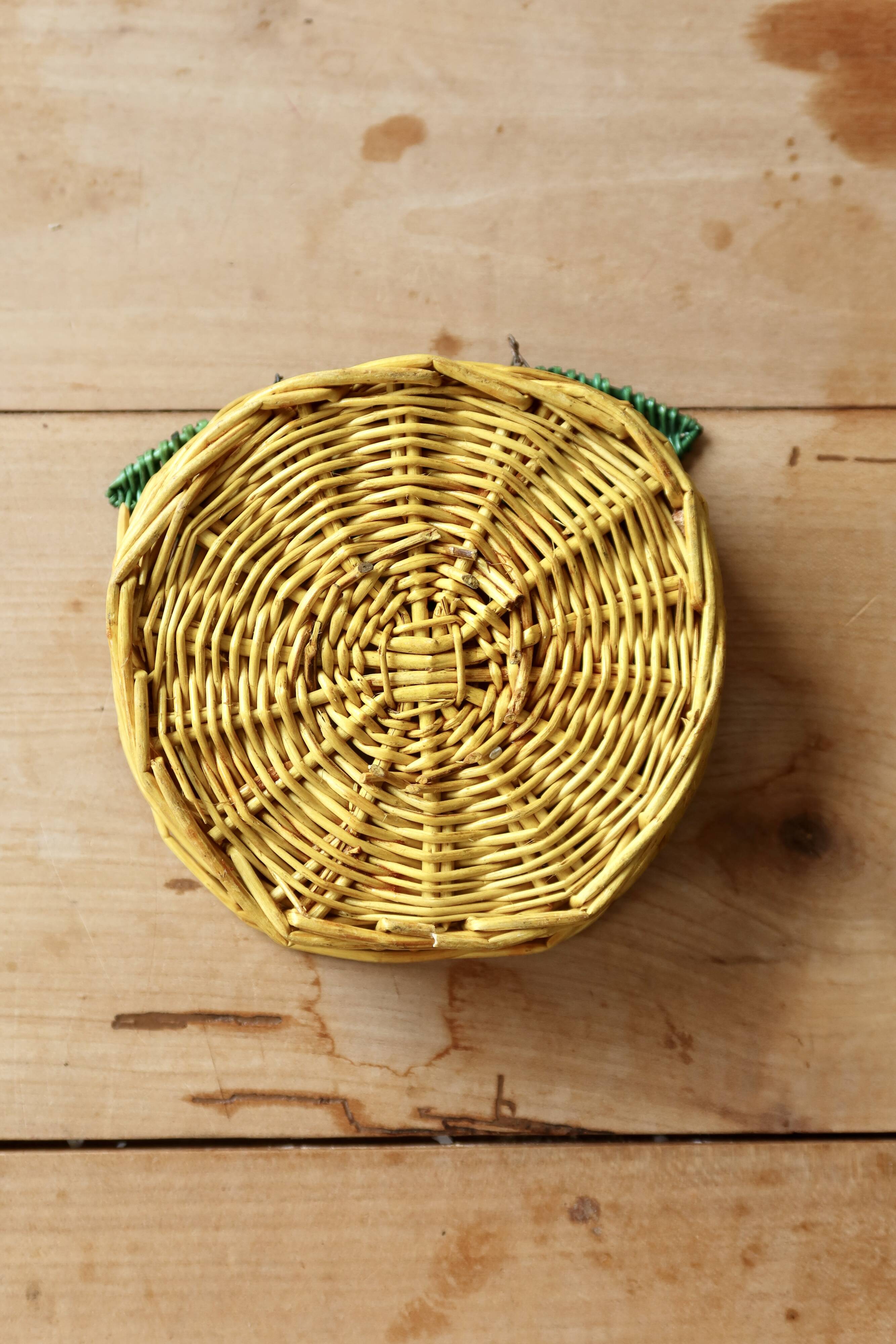 Small vintage wicker baskets in the shape of orange and lemon fruit