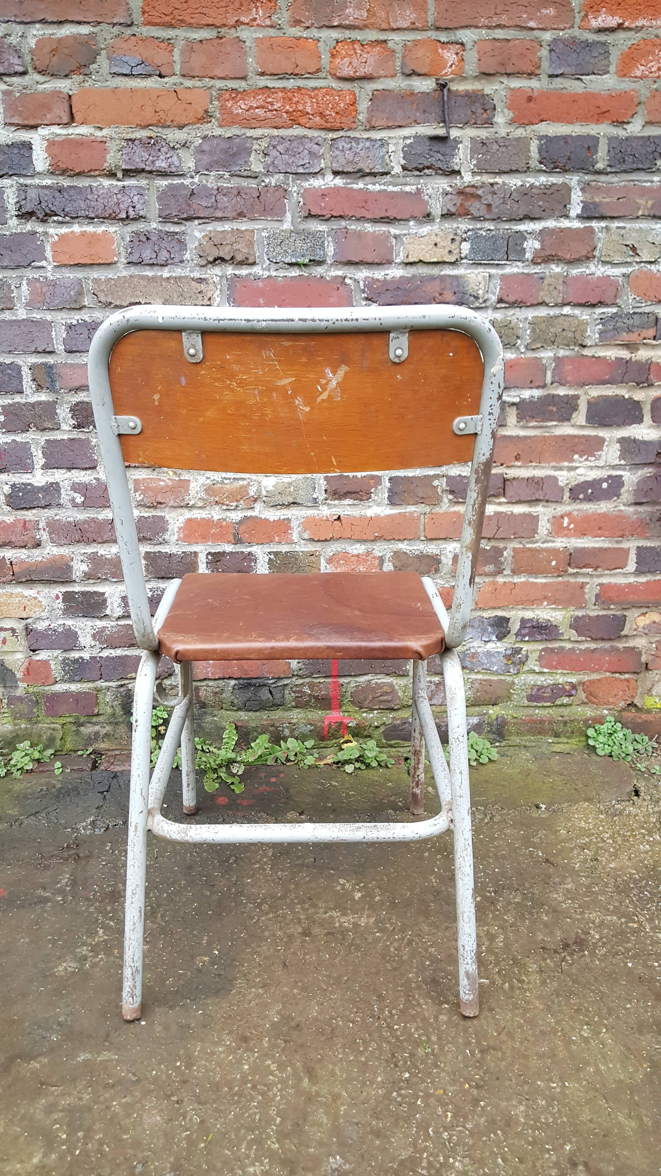 Vintage chair dated 1955 leather seat