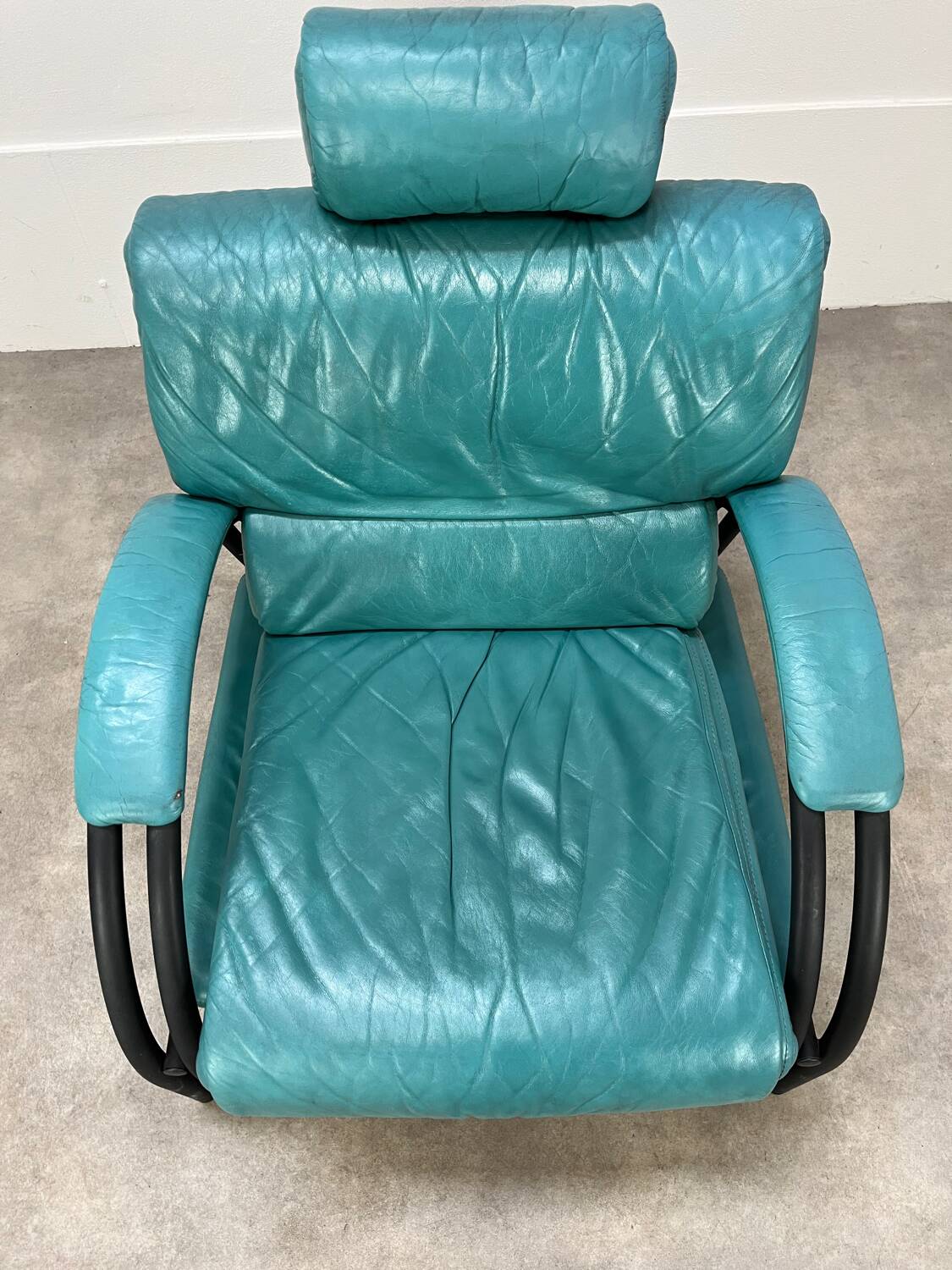 Postmodern design armchair and ottoman, 80s leather