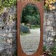 Miroir oval biseauté sur porte art déco Acajou 79x162