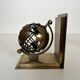 Pair of Brass Bookends with Openwork Globe Decorations. Work