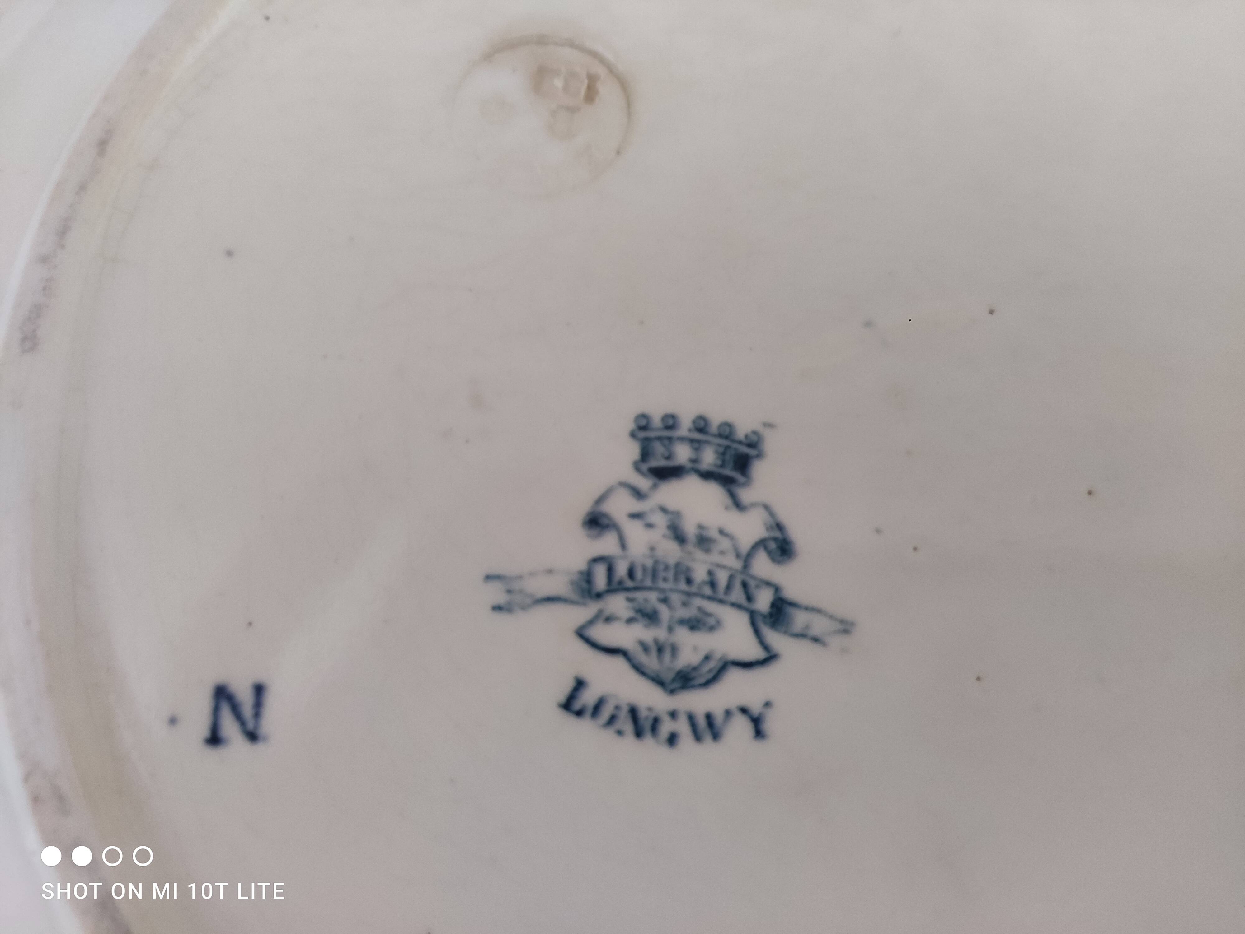 Round dish 2 in old earthenware from Longwy Lorrain model