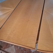 Round table in lemon wood with timeless design