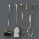 Antique fireplace tool in gilded zamak with duck head designs.