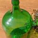 Superbe dame jeanne ancienne en verre vert